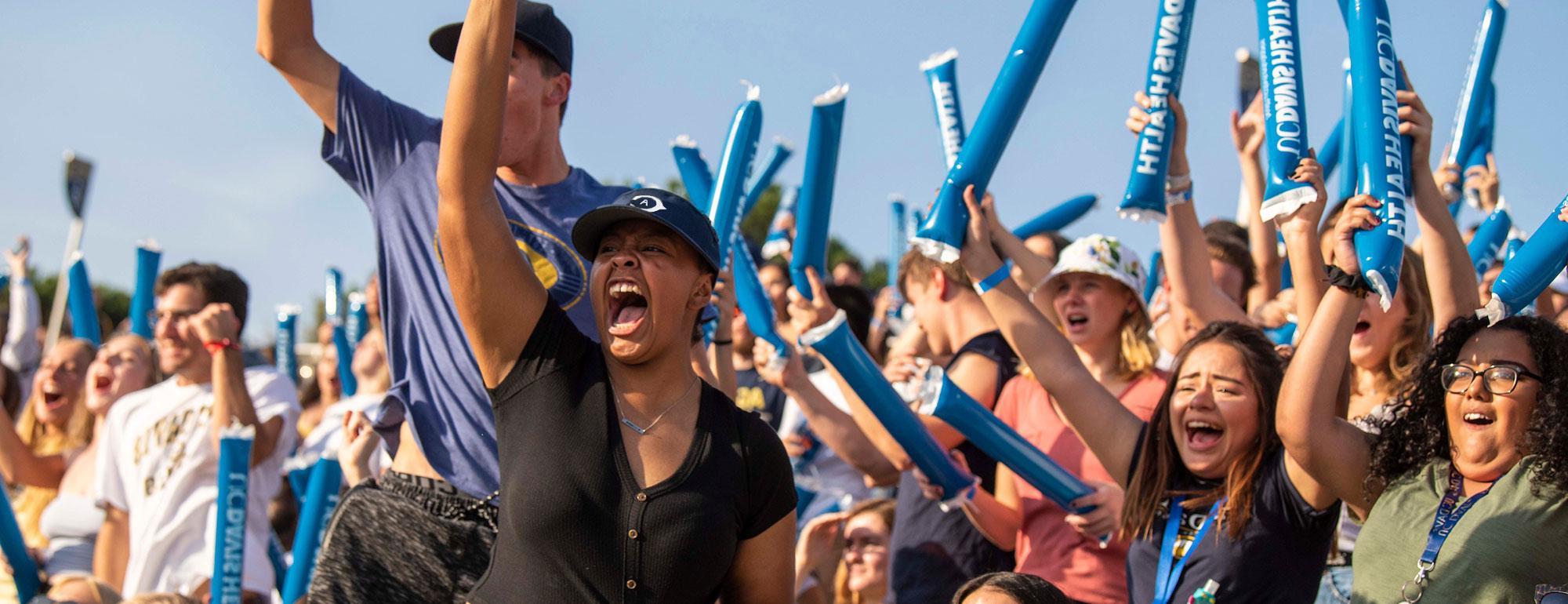 A rowdy crowd cheers on the Aggies at UC Davis Health Stadium.