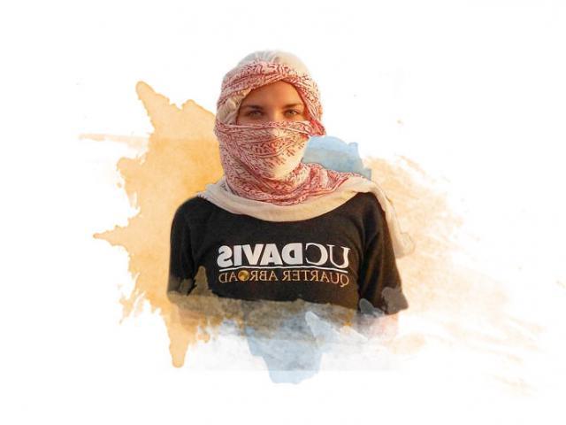 A female UC Davis student poses with a head scarf in Egypt