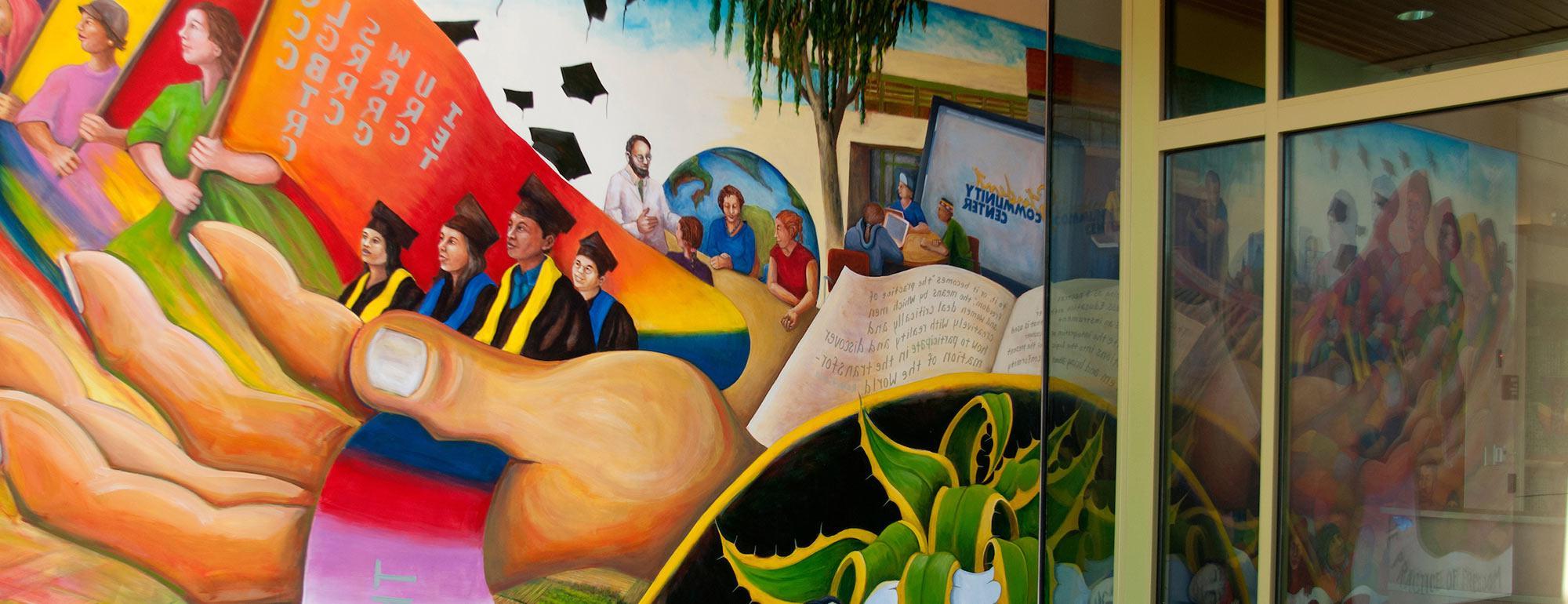 An image of a mural painted on the Student Community Center