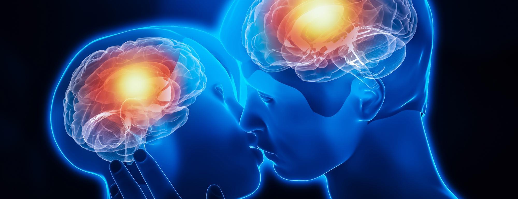 A computer rendering of two people kissing and their brains activating